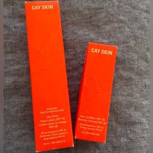 Cay Skin Isle glow face lotion SPF 45 and lip balm SPF 30